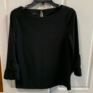 Ladies size small fancy black top by Talbots.